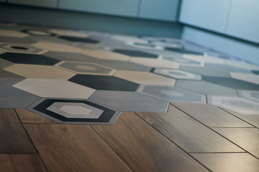 Wood and Tile flooring meeting