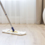 Mop on a floor, cleaning