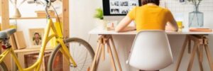 Woman sitting at her desk working in her home office