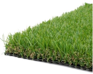 Close-up of a rectangular piece of artificial grass turf with green and brown blades on a black backing.